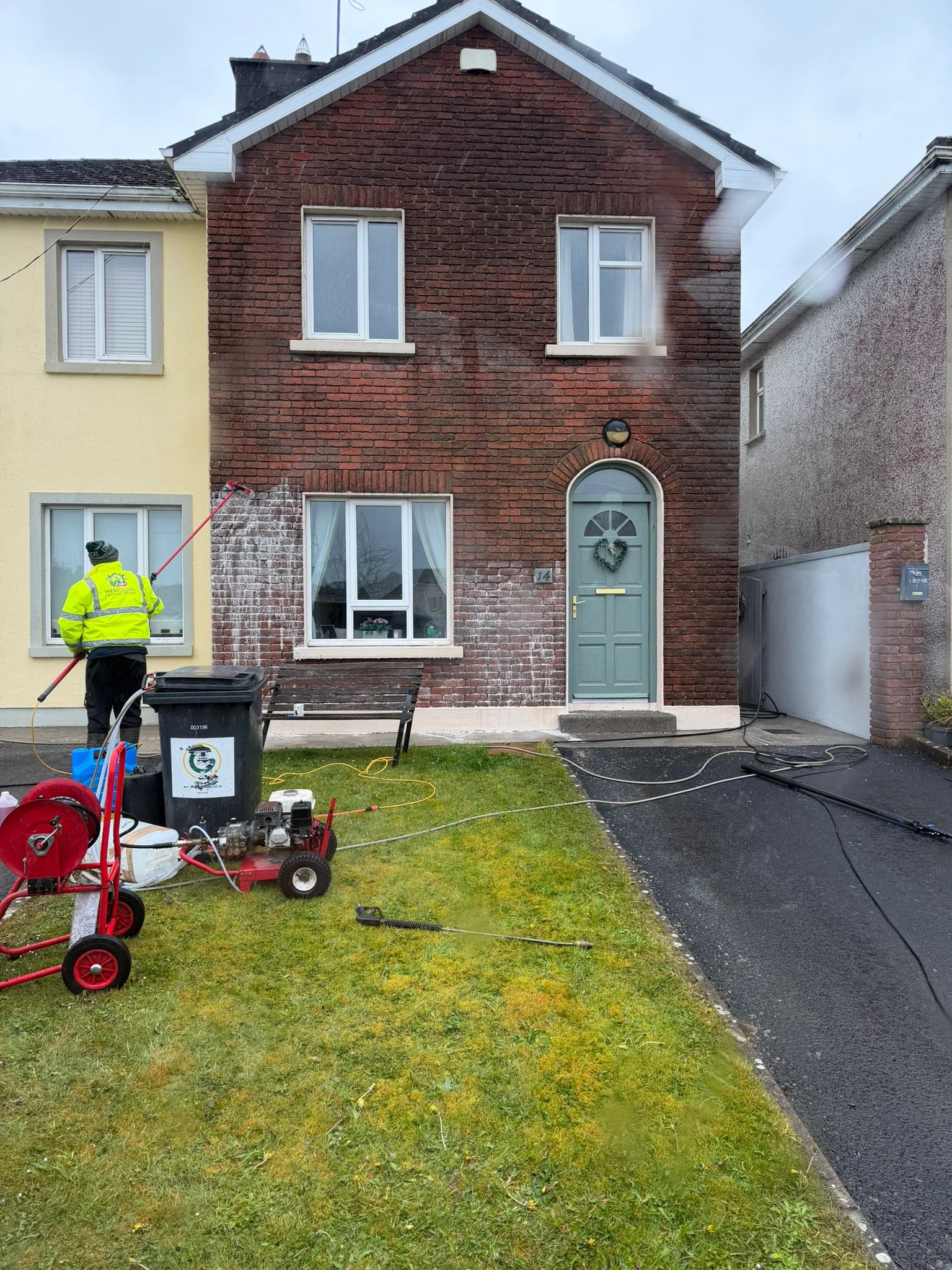Soft washing brick facade during exterior cleaning in Galway