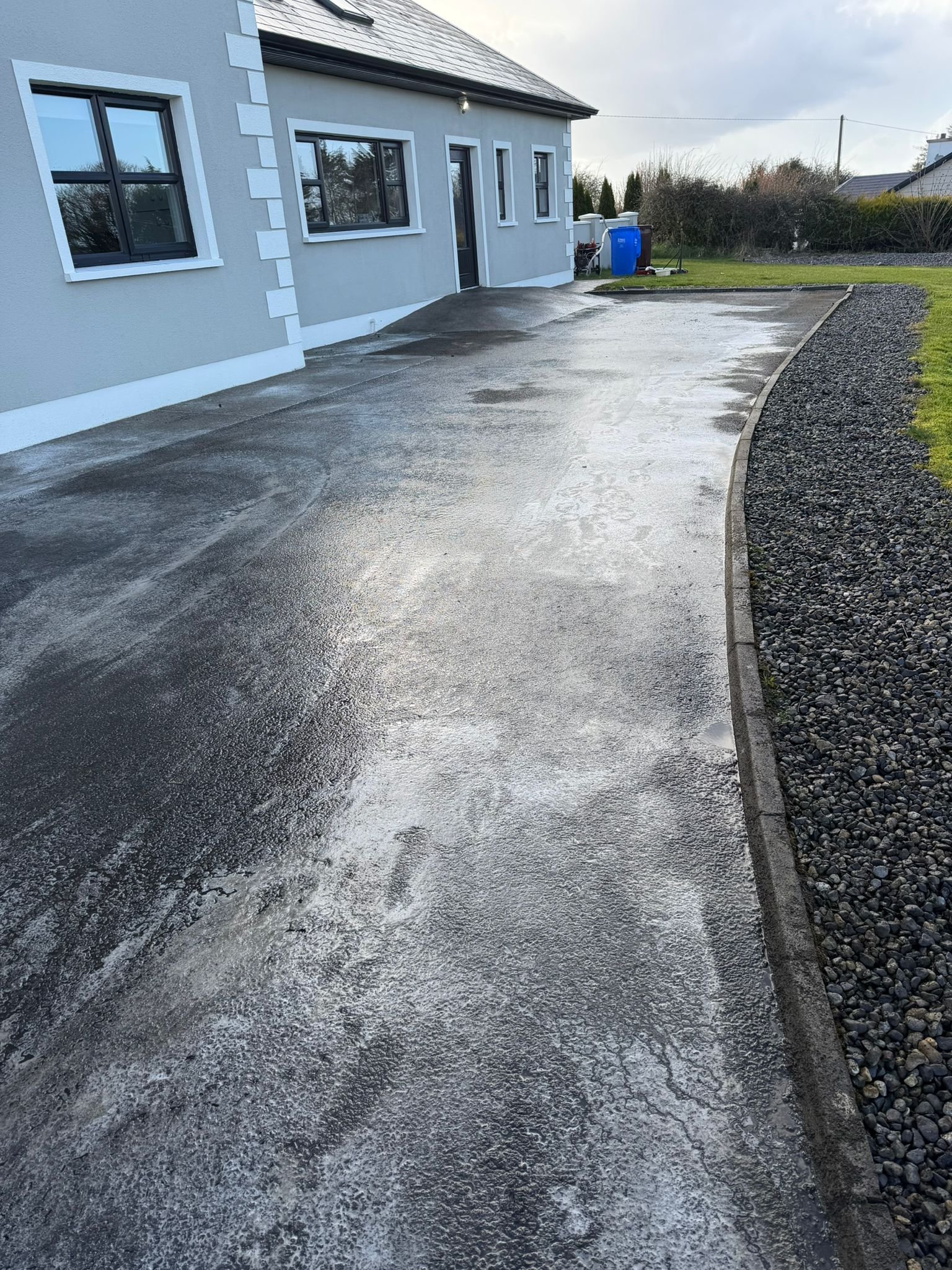 Power washing a tarmac driveway in Galway after surface treatment