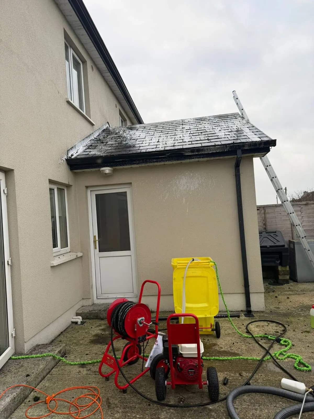 Roof soft wash cleaning setup at a residential property in County Galway