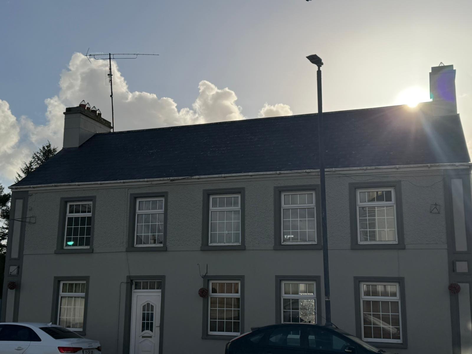 Townhouse roof cleaning project in Galway before exterior treatment